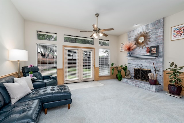 2203 Glen Helen Cir, Carrollton, TX 75007 - carpeted living area with a ceiling fan and a brick fireplace