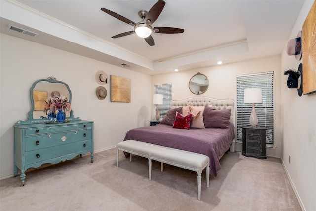 2203 Glen Helen Cir, Carrollton, TX 75007 - carpeted bedroom featuring a raised ceiling, crown molding, ceiling fan, and baseboards