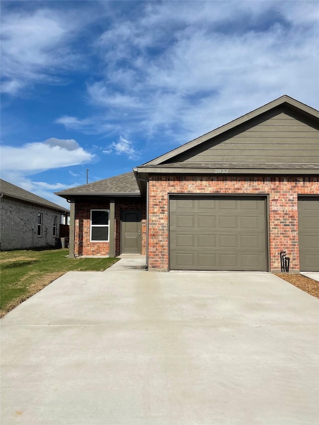 2829-2833 Peony Dr, Sherman, TX 75092 - ranch-style home with driveway, brick siding, a garage, and a front yard