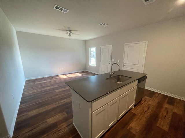 2829-2833 Peony Dr, Sherman, TX 75092 - kitchen featuring dishwasher, a sink, dark countertops, ceiling fan, and a kitchen island with sink