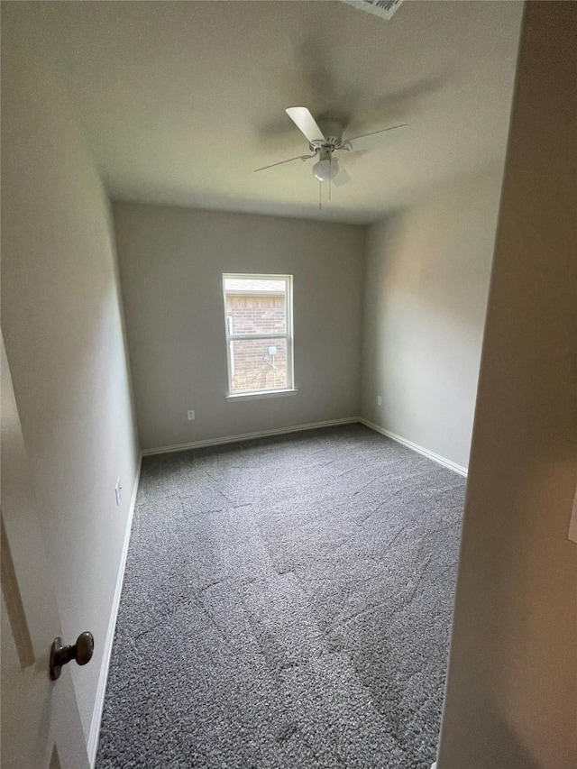 2829-2833 Peony Dr, Sherman, TX 75092 - spare room featuring carpet floors, baseboards, and a ceiling fan