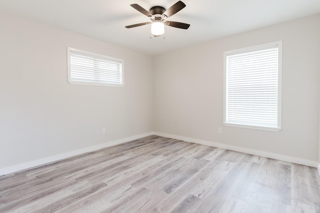 501 Edgewood Ave, Corsicana, TX 75110 - unfurnished room featuring light wood-style floors, ceiling fan, and baseboards