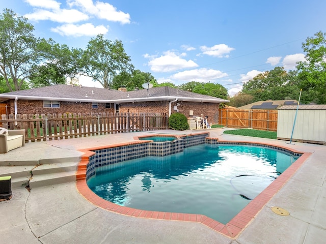 501 Edgewood Ave, Corsicana, TX 75110 - view of swimming pool featuring a fenced backyard, a patio area, and a pool with connected hot tub