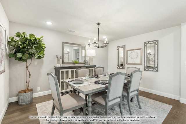1200 Hawk St, Wylie, TX 75098 - dining area with a chandelier, dark wood finished floors, baseboards, and recessed lighting