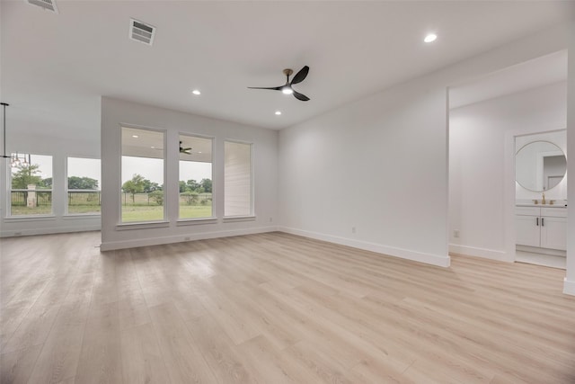 1008 Saint Matthew Cir, Royse City, TX 75189 - unfurnished living room with ceiling fan, light wood finished floors, baseboards, and recessed lighting