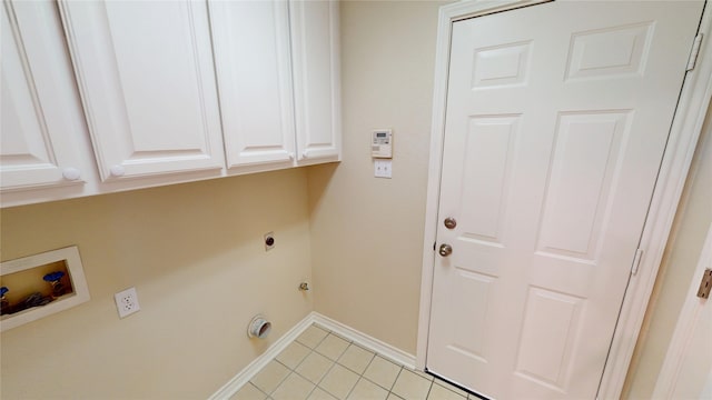 1913 Monte Cristo Way, Sherman, TX 75092 - washroom featuring electric dryer hookup, cabinet space, hookup for a washing machine, baseboards, and light tile patterned floors