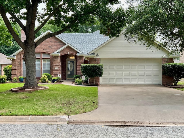 1913 Monte Cristo Way, Sherman, TX 75092 - view of front of property featuring brick siding, a garage, a shingled roof, and driveway