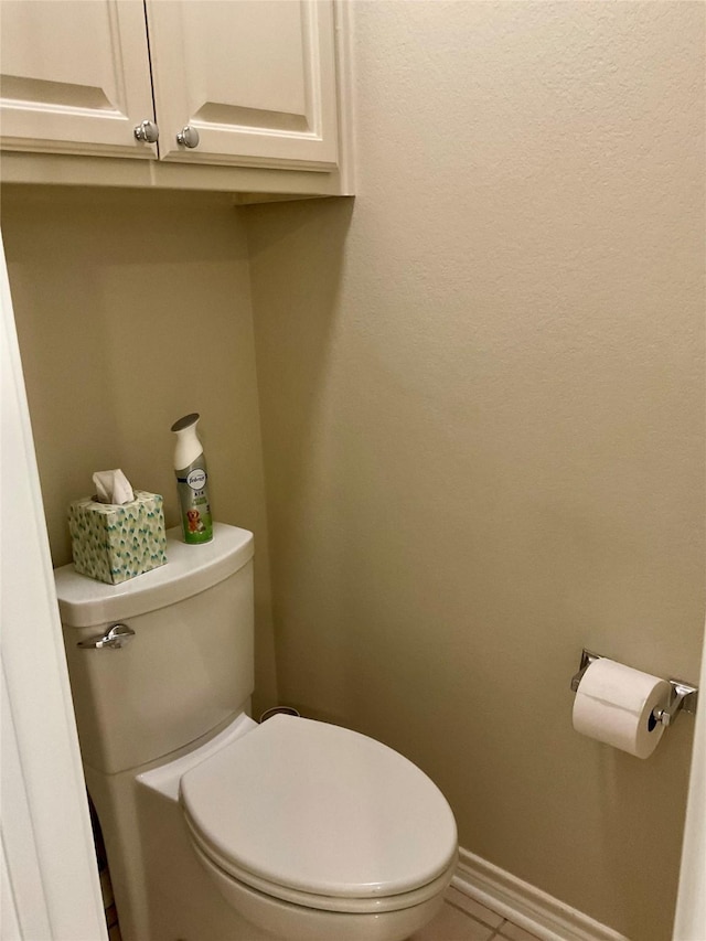 1913 Monte Cristo Way, Sherman, TX 75092 - bathroom featuring toilet, baseboards, and tile patterned flooring