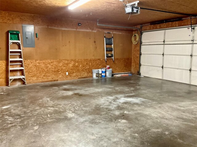 1913 Monte Cristo Way, Sherman, TX 75092 - garage featuring a garage door opener and electric panel