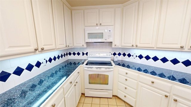 1913 Monte Cristo Way, Sherman, TX 75092 - kitchen with white appliances, tile counters, white cabinetry, and light tile patterned flooring