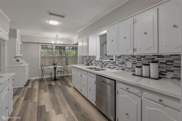 817 S Spruce St, Vivian, LA 71082 - kitchen featuring dishwasher, a chandelier, a sink, decorative backsplash, and ornamental molding
