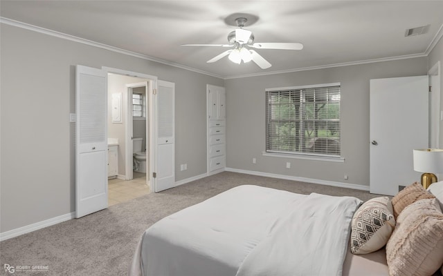 817 S Spruce St, Vivian, LA 71082 - bedroom with light carpet, ornamental molding, baseboards, connected bathroom, and ceiling fan