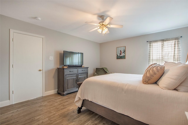 1034 Palomino Dr, Little Elm, TX 75068 - bedroom featuring light wood-style floors, baseboards, and ceiling fan
