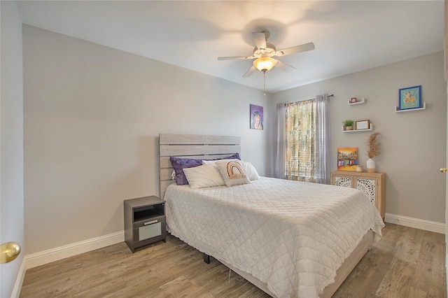 1034 Palomino Dr, Little Elm, TX 75068 - bedroom featuring light wood-style flooring, baseboards, and ceiling fan