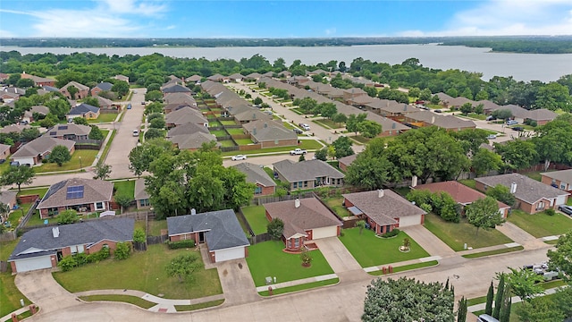 1034 Palomino Dr, Little Elm, TX 75068 - aerial perspective of suburban area with a large body of water