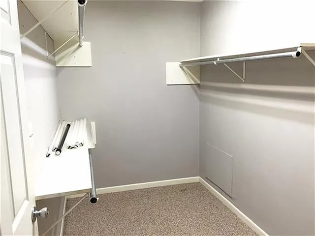 2406 14th Th, Brownwood, TX 76801 - spacious closet featuring carpet