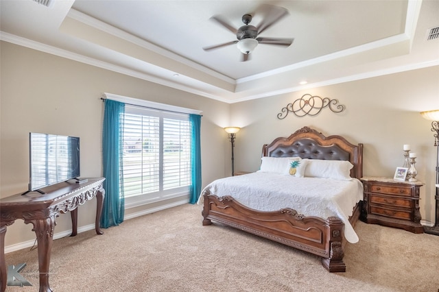 7201 Mcleod Dr, Abilene, TX 79602 - bedroom featuring a tray ceiling, crown molding, carpet floors, ceiling fan, and baseboards