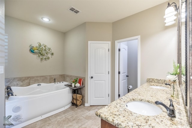 7201 Mcleod Dr, Abilene, TX 79602 - full bath featuring a bath, double vanity, and tile patterned floors