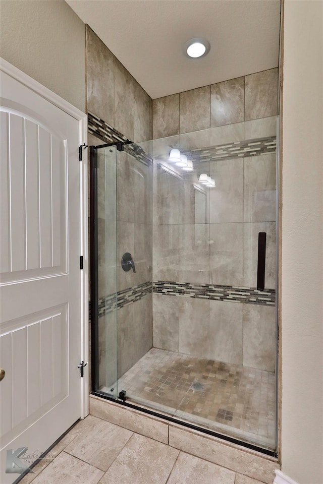 7201 Mcleod Dr, Abilene, TX 79602 - bathroom featuring a stall shower and tile patterned floors