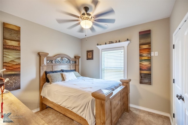 7201 Mcleod Dr, Abilene, TX 79602 - bedroom with light colored carpet, baseboards, and ceiling fan