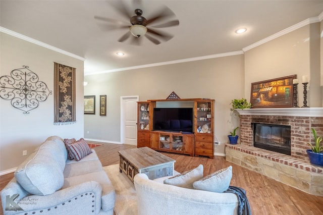 7201 Mcleod Dr, Abilene, TX 79602 - living room with ceiling fan, wood finished floors, ornamental molding, a brick fireplace, and baseboards