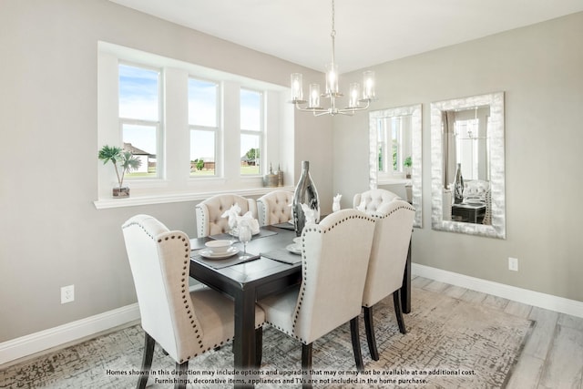 406 Maltese Cir, Wylie, TX 75098 - dining space featuring a chandelier, plenty of natural light, and baseboards