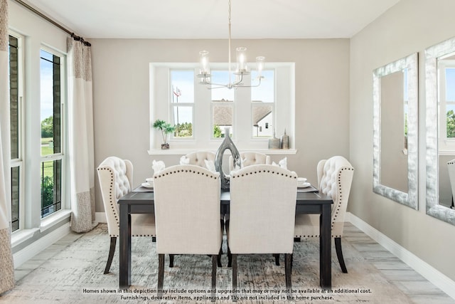 406 Maltese Cir, Wylie, TX 75098 - dining room with a chandelier and baseboards