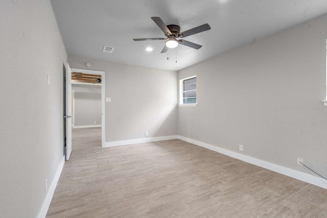 6012 Whispering Ln, Watauga, TX 76148 - unfurnished room featuring ceiling fan, light wood finished floors, and baseboards