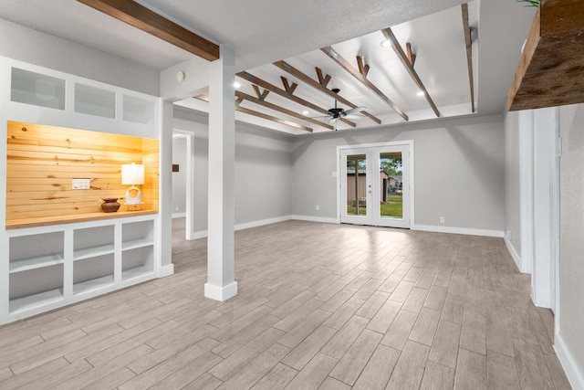 6012 Whispering Ln, Watauga, TX 76148 - unfurnished living room with beamed ceiling, wood finished floors, baseboards, and ceiling fan