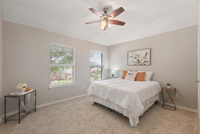 5305 Elmdale Dr, Watauga, TX 76137 - bedroom with light colored carpet, baseboards, and ceiling fan