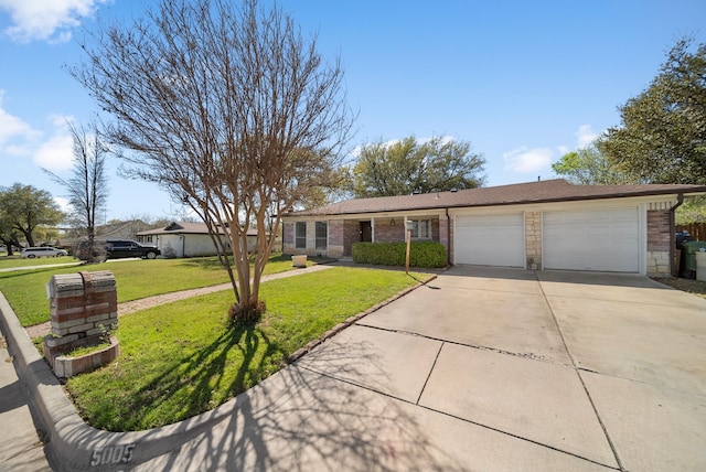 5005 Nevada Trl, North Richland Hills, TX 76180 - ranch-style house with a garage, concrete driveway, a front lawn, and stone siding