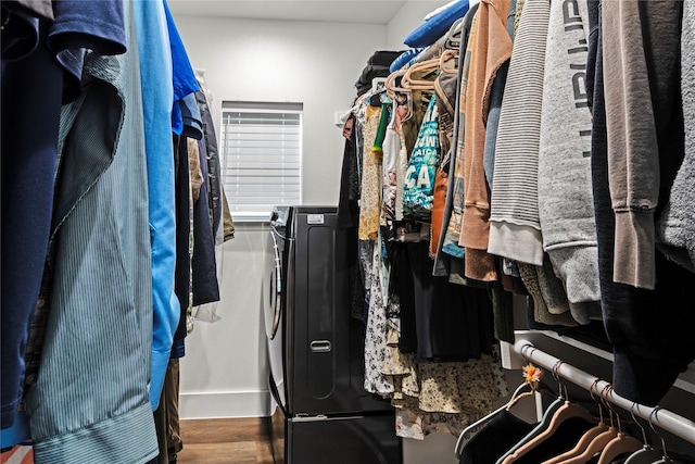 138 Sunset Dr, Gun Barrel City, TX 75156 - walk in closet with wood finished floors and washer and dryer