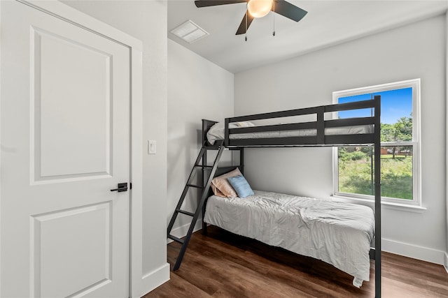 138 Sunset Dr, Gun Barrel City, TX 75156 - bedroom featuring baseboards, wood finished floors, and ceiling fan