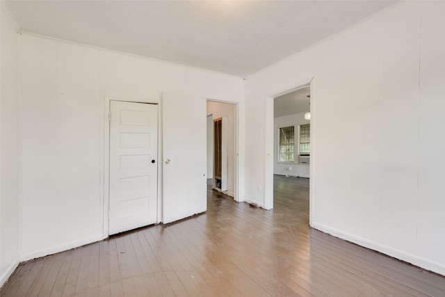 1622 Ave B, Dallas, TX 75203 - unfurnished room with hardwood / wood-style flooring and baseboards
