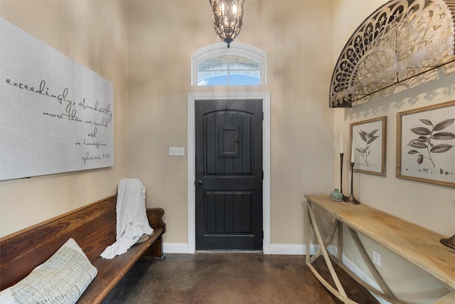 9359 W 5th St, Crawford, TX 76638 - entryway featuring concrete floors, baseboards, and a high ceiling