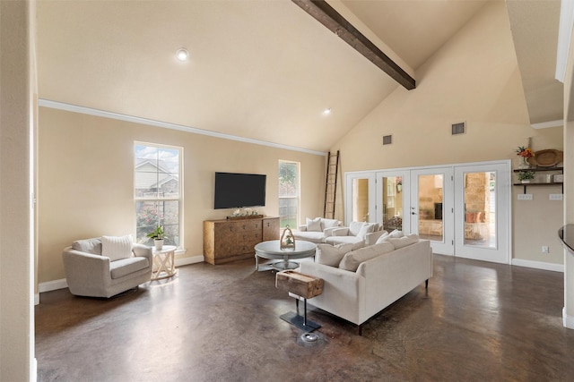 9359 W 5th St, Crawford, TX 76638 - living area with finished concrete floors, beam ceiling, baseboards, high vaulted ceiling, and ornamental molding