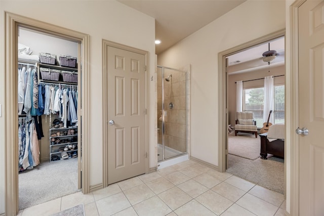 7704 Michael Ct, Mckinney, TX 75071 - ensuite bathroom featuring tile patterned floors, a shower stall, baseboards, a walk in closet, and recessed lighting