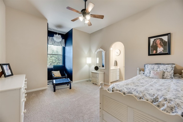 7704 Michael Ct, Mckinney, TX 75071 - bedroom with light colored carpet, baseboards, arched walkways, and ceiling fan