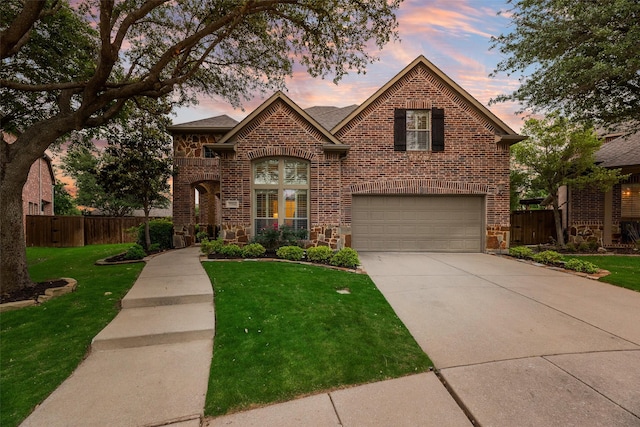 7704 Michael Ct, Mckinney, TX 75071 - view of front of home featuring brick siding, a garage, driveway, stone siding, and a shingled roof