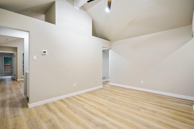 1202 Bayshore Dr, Rockwall, TX 75087 - spare room with light wood finished floors, baseboards, high vaulted ceiling, beam ceiling, and ceiling fan