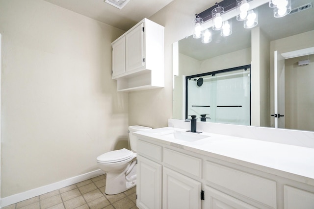 1202 Bayshore Dr, Rockwall, TX 75087 - bathroom featuring baseboards, toilet, a shower stall, tile patterned flooring, and vanity