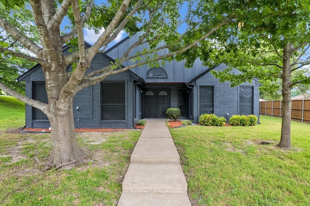 1202 Bayshore Dr, Rockwall, TX 75087 - view of front of house featuring brick siding