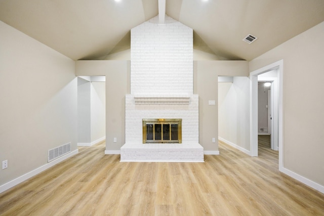 1202 Bayshore Dr, Rockwall, TX 75087 - unfurnished living room featuring wood finished floors, baseboards, and a fireplace