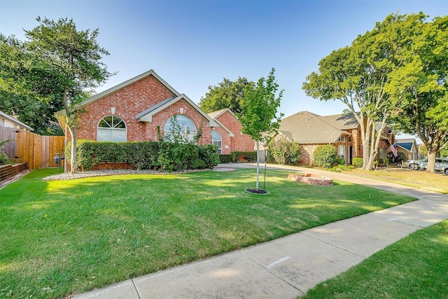 ranch-style house with brick siding
