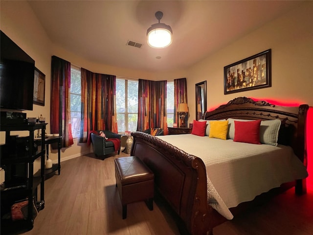 6869 Cape Cod Dr, Grand Prairie, TX 75054 - bedroom featuring wood finished floors and baseboards