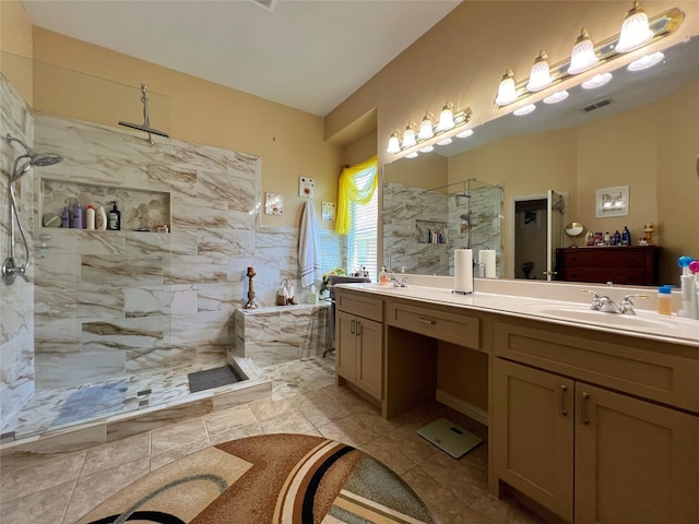 6869 Cape Cod Dr, Grand Prairie, TX 75054 - bathroom with a marble finish shower, double vanity, and tile patterned flooring