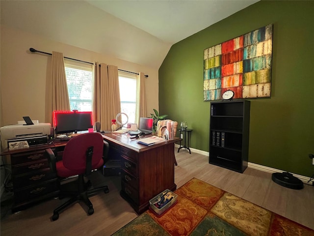 6869 Cape Cod Dr, Grand Prairie, TX 75054 - office area featuring wood finished floors, lofted ceiling, and baseboards