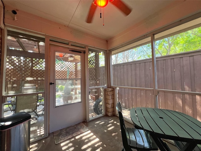 6869 Cape Cod Dr, Grand Prairie, TX 75054 - unfurnished sunroom featuring a ceiling fan, plenty of natural light, and outdoor dining space