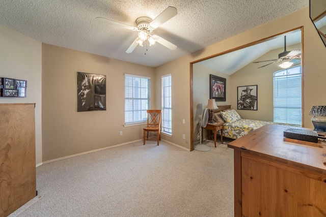 5704 Poole Dr, The Colony, TX 75056 - home office featuring ceiling fan, light colored carpet, a textured ceiling, baseboards, and vaulted ceiling