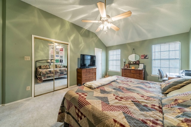 5704 Poole Dr, The Colony, TX 75056 - bedroom with lofted ceiling, carpet, a ceiling fan, a closet, and baseboards